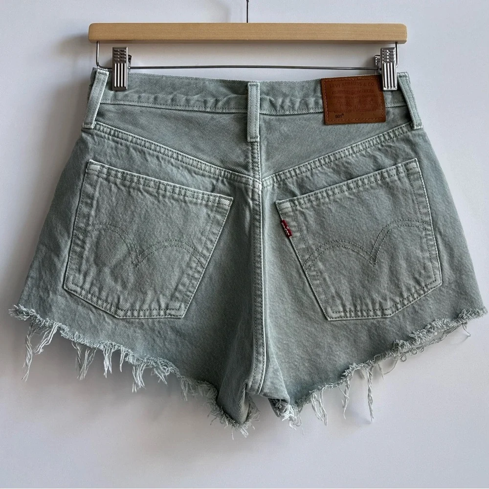 Levi’s Dusty Lily Pad Raw Hem Buttonfly Denim Jean Shorts Olive Green Size 27